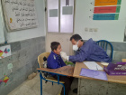 انجام طرح وارنیش فلوراید تراپی و معاینه دانش آموزان مدرسه ابتدایی حقیقت روستای احمد آباد
